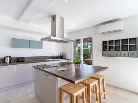 Cabinetry, Countertop, Furniture, Property, Table, Sink, Wood, Kitchen, Kitchen Stove, Interior Design