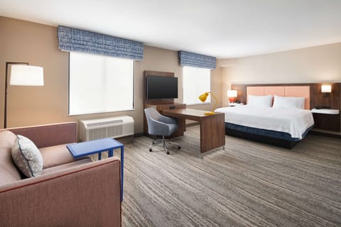 Suite, 1 King Bed, Refrigerator & Microwave (Wet Bar) | In-room safe, desk, laptop workspace, blackout drapes