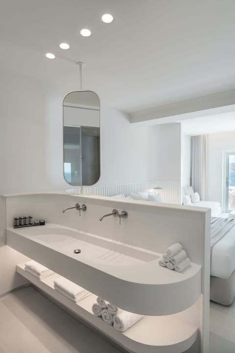 Superior Suite, Sea View | Bathroom | Shower, rainfall showerhead, designer toiletries, hair dryer
