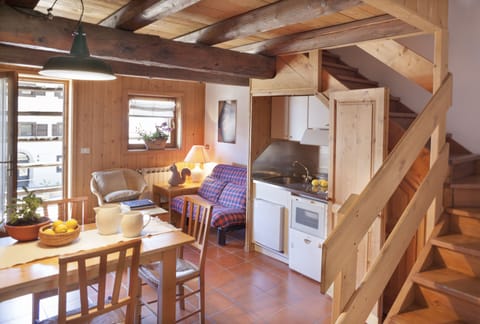 Family Apartment (2 Adults + 1 Child) | Living area | Flat-screen TV