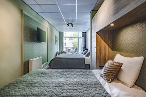 Standard Quadruple Room, Balcony | Premium bedding, pillowtop beds, in-room safe, desk