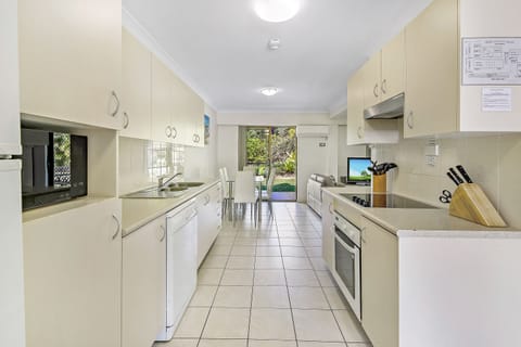 Two Bedroom Spa Apartment | Private kitchen | Full-size fridge, microwave, oven, stovetop