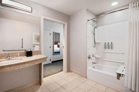 Room, 2 Queen Beds | Bathroom | Shower, free toiletries, hair dryer, towels