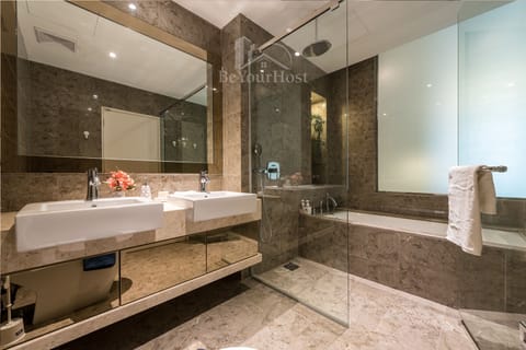 Studio Suite | Bathroom | Separate tub and shower, deep soaking tub, rainfall showerhead
