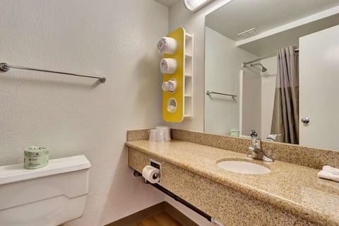 Deluxe Room, 2 Queen Beds, Non Smoking, Refrigerator | Bathroom | Combined shower/tub, towels, soap, shampoo