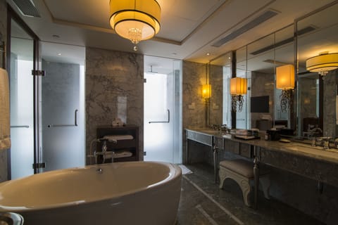 Suite, 1 King Bed | Bathroom | Deep soaking tub, rainfall showerhead, free toiletries, hair dryer