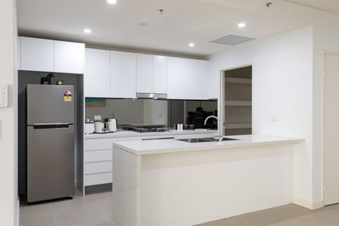 Deluxe Apartment, 1 Bedroom | Private kitchen | Full-size fridge, oven, stovetop, dishwasher