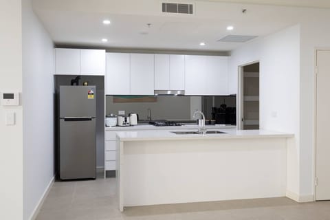 Deluxe Apartment, 1 Bedroom | Private kitchen | Full-size fridge, oven, stovetop, dishwasher