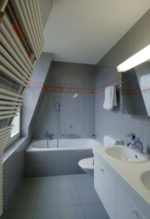 Deluxe Apartment, 4 Bedrooms, City View | Bathroom | Shower, hair dryer, bathrobes, towels