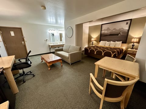 Suite, 1 King Bed, Non Smoking | Desk, blackout drapes, free WiFi, bed sheets