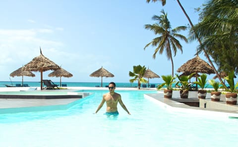 Outdoor pool, pool umbrellas, sun loungers