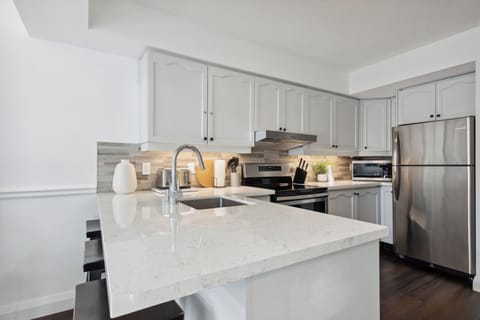 Signature Condo, 2 Bedrooms | Private kitchen | Full-size fridge, microwave, oven, stovetop