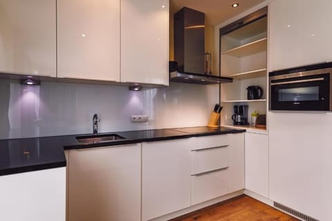 Superior Penthouse, 3 Bedrooms | Private kitchen | Fridge, espresso maker, coffee/tea maker, electric kettle