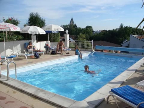 Seasonal outdoor pool, open 8:30 AM to 8:00 PM, sun loungers