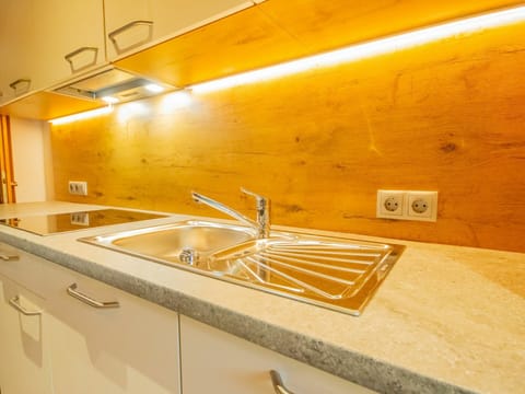 Tap, Building, Sink, Plumbing Fixture, Cabinetry, Countertop, Wood, Interior Design, House