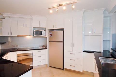 Superior Apartment, 3 Bedrooms | Private kitchen | Full-size fridge, microwave, stovetop, dishwasher