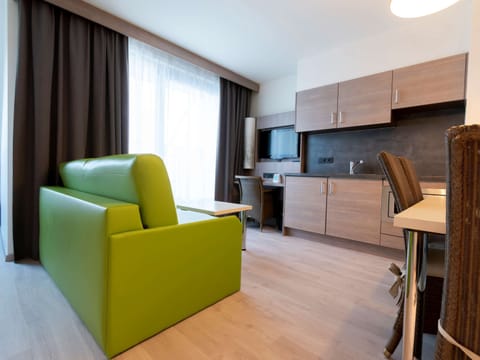 Junior Suite, 1 King Bed with Sofa bed, Balcony | In-room safe, desk, laptop workspace, blackout drapes