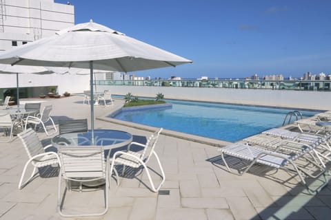 Outdoor pool, pool umbrellas, sun loungers