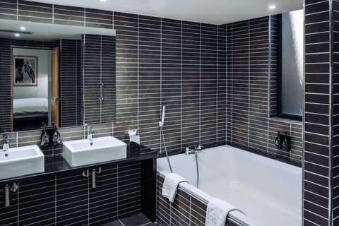 Penta Junior Suite | Bathroom | Shower, rainfall showerhead, designer toiletries, hair dryer