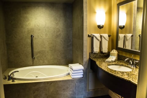 Suite, 1 King Bed | Deep soaking bathtub