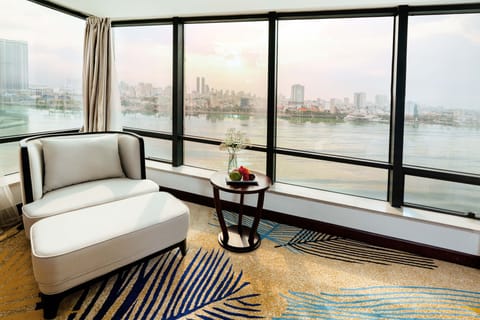 Grand Suite Double River Front | Living area | Flat-screen TV, iPod dock