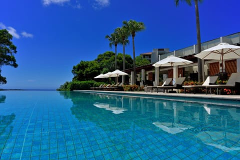 Outdoor pool, pool umbrellas, sun loungers