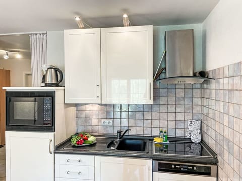 Kitchen Appliance, Kitchen, Countertop, Major Appliance, Cabinetry, Plumbing Fixture, Sink, Home Appliance, Interior Design, Tap