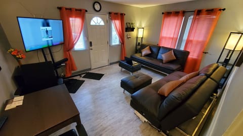 living space with entertainment center and office space.