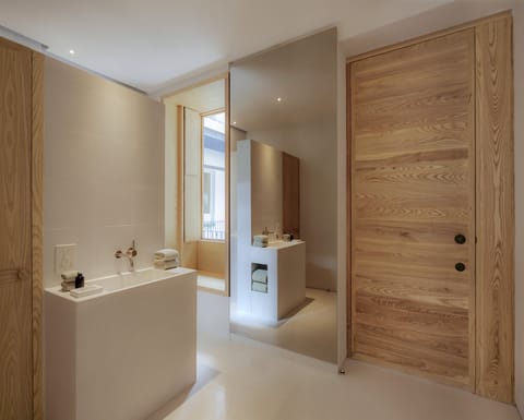 Studio Suite, Balcony | Bathroom | Shower, rainfall showerhead, bathrobes, slippers