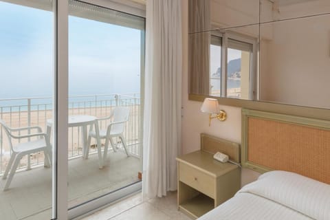 Standard Room, Balcony, Sea View | Minibar, in-room safe, desk, free WiFi