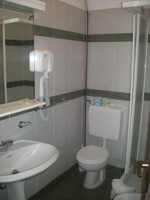 Standard Apartment, 2 Bedrooms, Tower | Bathroom | Shower, rainfall showerhead, free toiletries, hair dryer