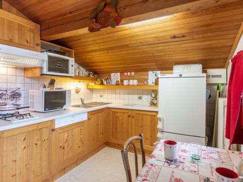 Cabinetry, Property, Countertop, Wood, Kitchen Appliance, Interior Design, Kitchen Stove, Flooring, Floor, Wood Stain