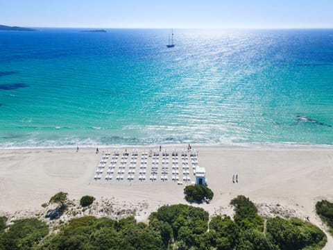 Private beach, white sand, sun loungers, beach umbrellas