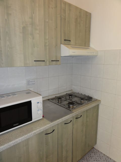 Apartment, 2 Bedrooms (A60161) | Private kitchenette | Full-size fridge, microwave, stovetop, cookware/dishes/utensils