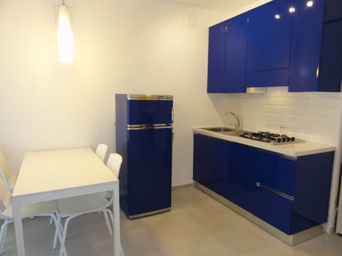 Apartment, 1 Bedroom (A80326) | Private kitchenette | Full-size fridge, stovetop, electric kettle, cookware/dishes/utensils