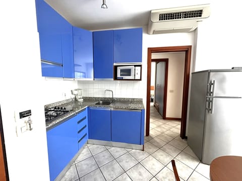 Apartment, 2 Bedrooms (A90277) | Private kitchenette | Full-size fridge, microwave, stovetop, dishwasher