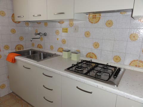 Apartment, 2 Bedrooms (B10012) | Private kitchenette | Full-size fridge, microwave, stovetop, cookware/dishes/utensils