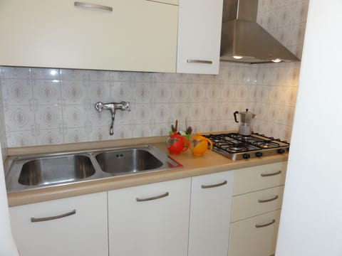 Apartment, 2 Bedrooms (B30048) | Private kitchen | Full-size fridge, microwave, stovetop, cookware/dishes/utensils