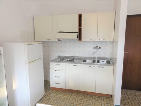 Apartment, 1 Bedroom (Via Lira 62 C40081) | Private kitchenette | Full-size fridge, microwave, cookware/dishes/utensils