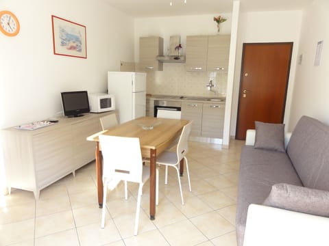 Apartment, 1 Bedroom (Via Lira 62 C30048) | Private kitchenette | Full-size fridge, microwave, cookware/dishes/utensils