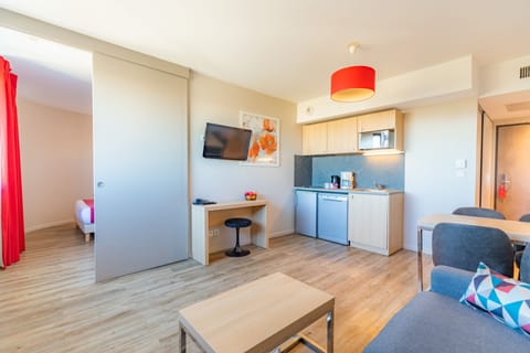 Apartment, 1 Bedroom | Living area | Flat-screen TV