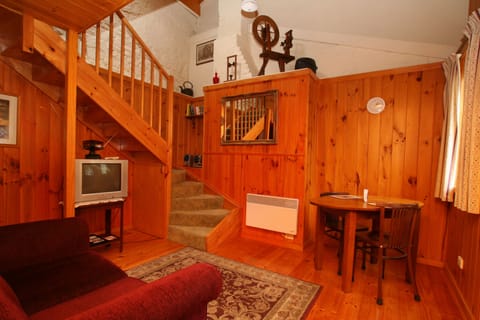 One Bedroom Cottage | Living area | 48-cm LCD TV with digital channels, TV, DVD player