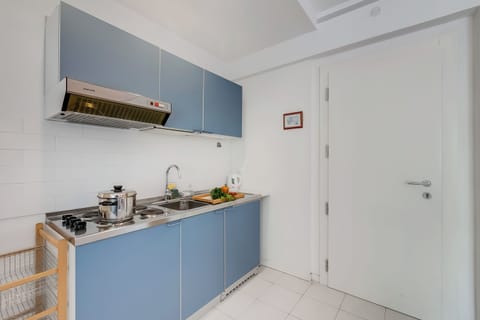 Family Apartment, 1 Bedroom, Lakeside (Residenza Lago D'Argento) | Private kitchen | Fridge, microwave, stovetop, coffee/tea maker