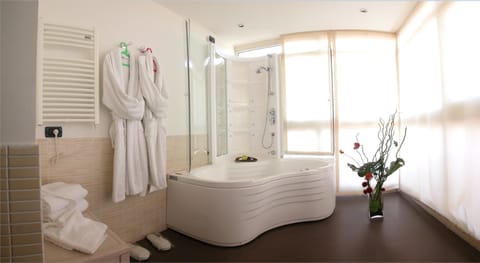 Suite, 1 King Bed, Terrace | Bathroom | Shower, free toiletries, hair dryer, bidet