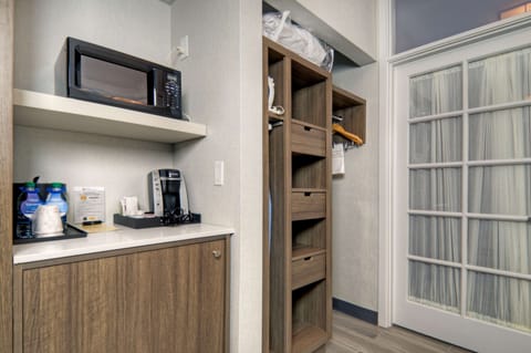 One King One Bedroom Suite | Desk, laptop workspace, iron/ironing board, free cribs/infant beds