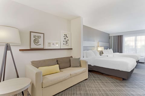 Suite, 2 Queen Beds, Non Smoking | In-room safe, desk, iron/ironing board, free cribs/infant beds