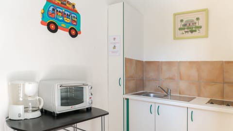 Studio Standard | Private kitchenette | Full-size fridge, microwave, oven, stovetop