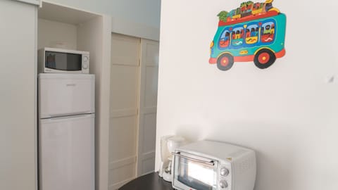 Studio Standard | Private kitchenette | Full-size fridge, microwave, oven, stovetop