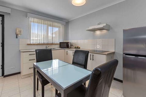 Standard Apartment, Multiple Beds, Accessible, Kitchenette | Private kitchenette | Fridge, electric kettle, freezer, dining tables