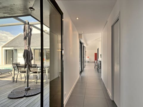 Building, Table, Interior Design, Hall, Flooring, Floor, Chair, Shade, Door, Ceiling